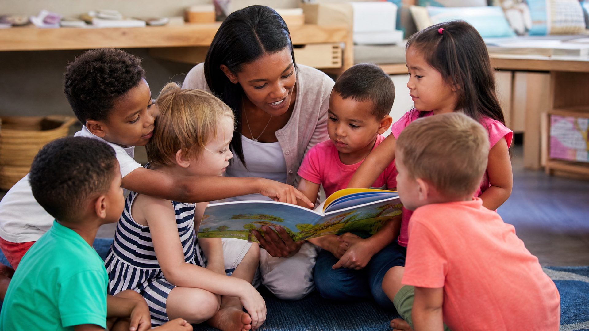 Teacher with children at Little Bergen Academy